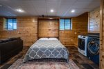 Queen size Murphy bed in the basement family room 
